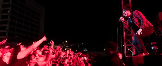 Performer at Las Rageous in front of the screaming crowd.
