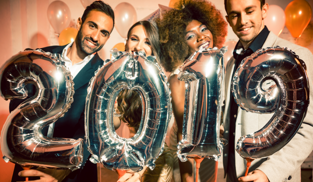 People Holding 2019 New Year’s Eve Balloons