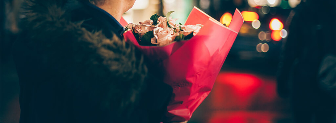 Man Waiting with Flowers for Valentine's Day in Vegas