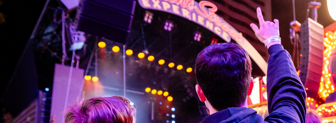 Person Cheering at Fremont Street Concert in Las Vegas